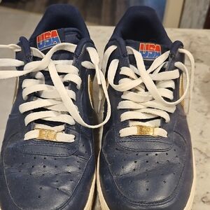 Nike Blue and White Sneakers with Gold Accents